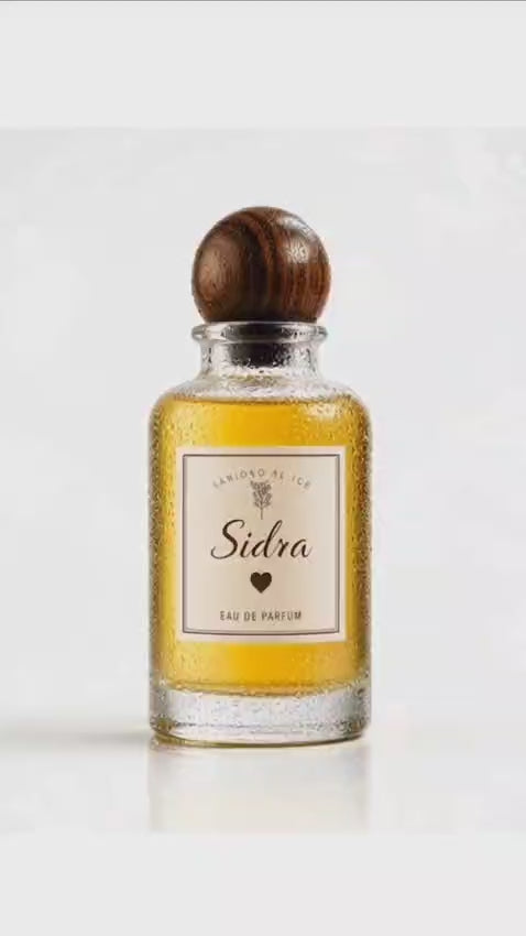 Sidra perfume bottle by Bloograna Perfumes with elegant glass design and floral accents, showcasing a luxurious fragrance.